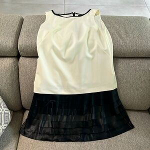 White dress with leather skirt look